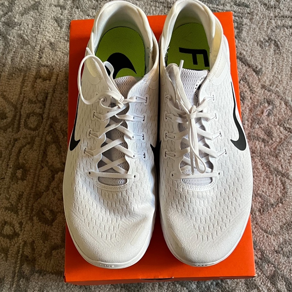 Nike Free Run in White. Gently Used. Size 15